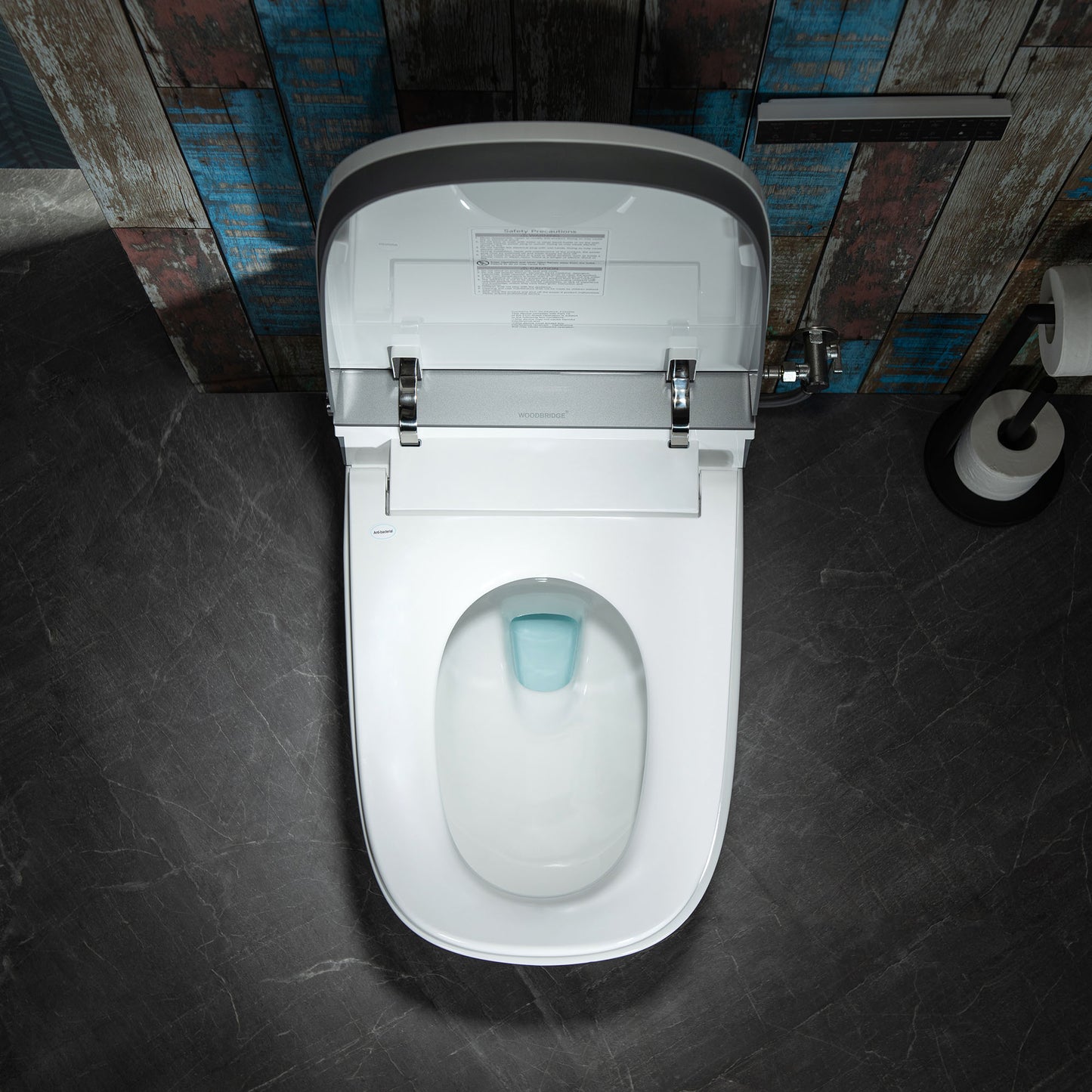White toilet with a closed lid in a bathroom setting